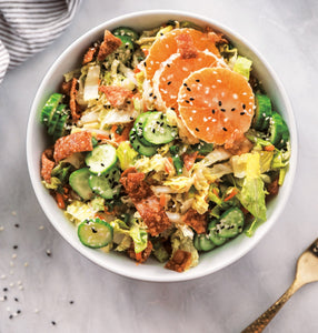 You'll love the combination of romaine lettuce and napa cabbage for this salad, and the carrots and cucumber add extra veggie power and crunch