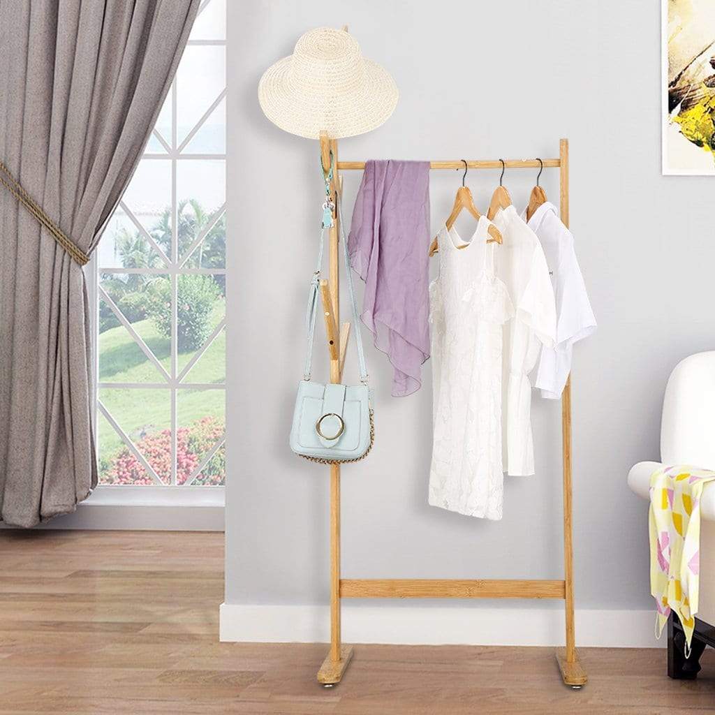 Explore langria single rail bamboo garment rack with 8 side hook tree stand coat hanger and four stable leveling feet for jacket umbrella clothes hats scarf and handbags natural wood finish