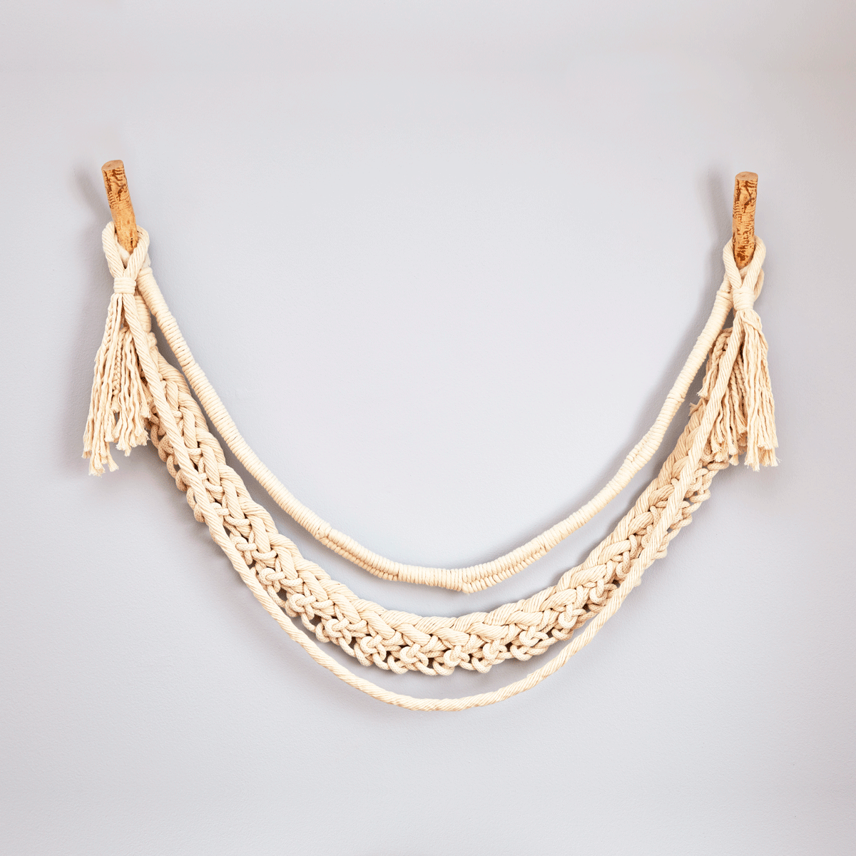 Wall Tendrils by COG are bespoke, handmade wall sculptures. Sweeping "tendrils" add textural, dimensional and soft detail to interior design